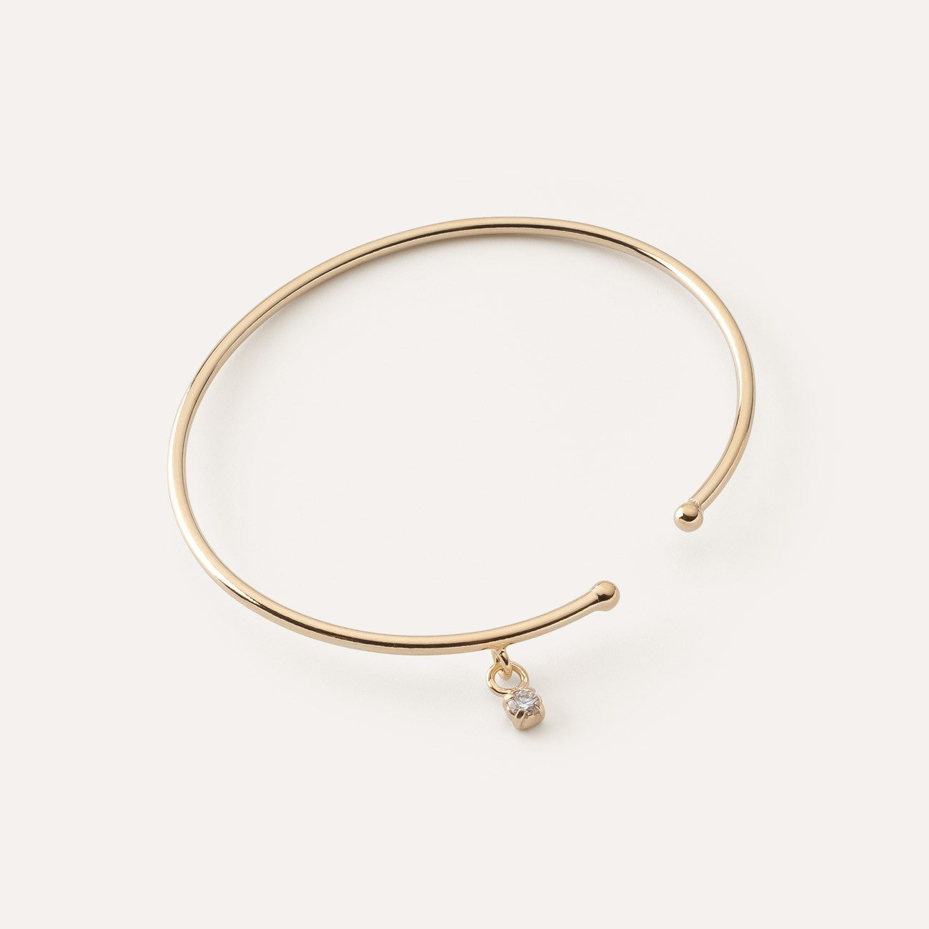 Armreif mit Zirkoniasteinen gelbvergoldet RE:SHAPE