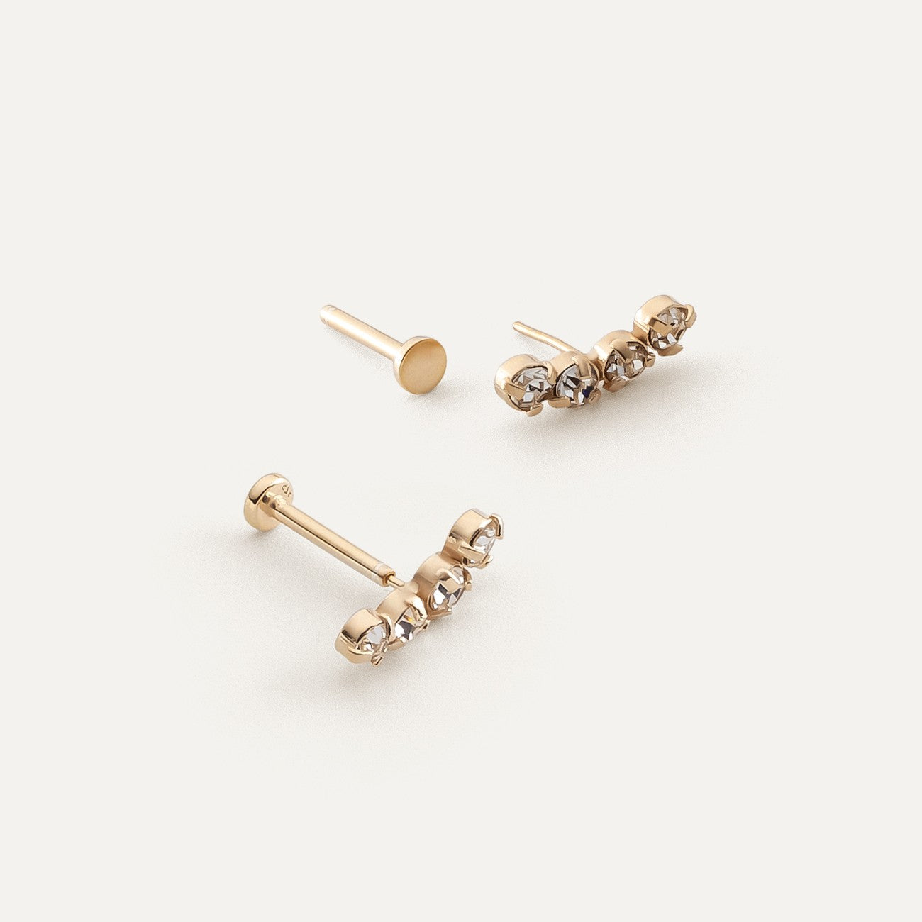 Labret-Ohrringe mit weißen Zirkonen gelbvergoldet RE:SHAPE