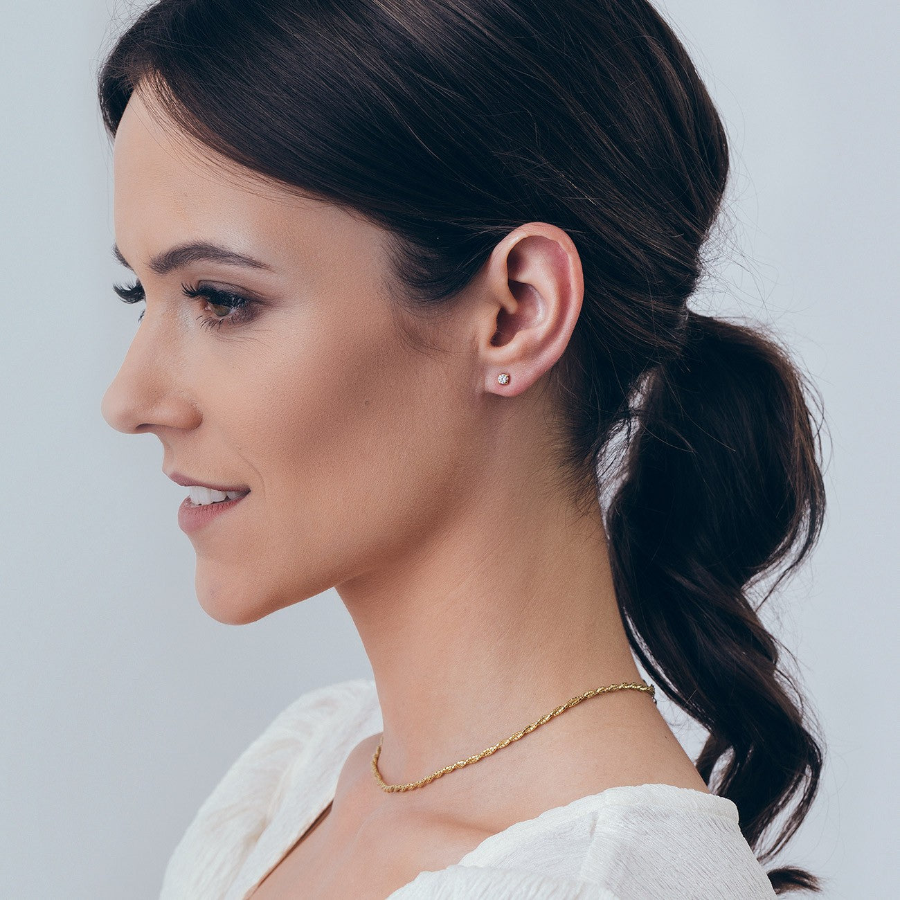 Ohrringe mit 3 mm Zirkonia, 925er Silber gelbvergoldet