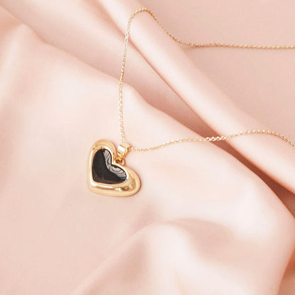 Collier cœur asymétrique noir en résine, argent 925 plaqué or jaune NOUVEAU ROMANTIQUE
